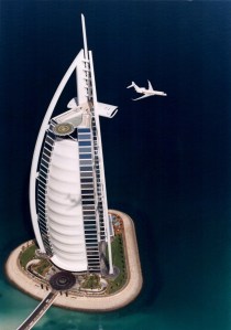 Flying high in Dubai: The Global Express business jet flies past the iconic Burj Al Arab Hotel. Bombardier photo
